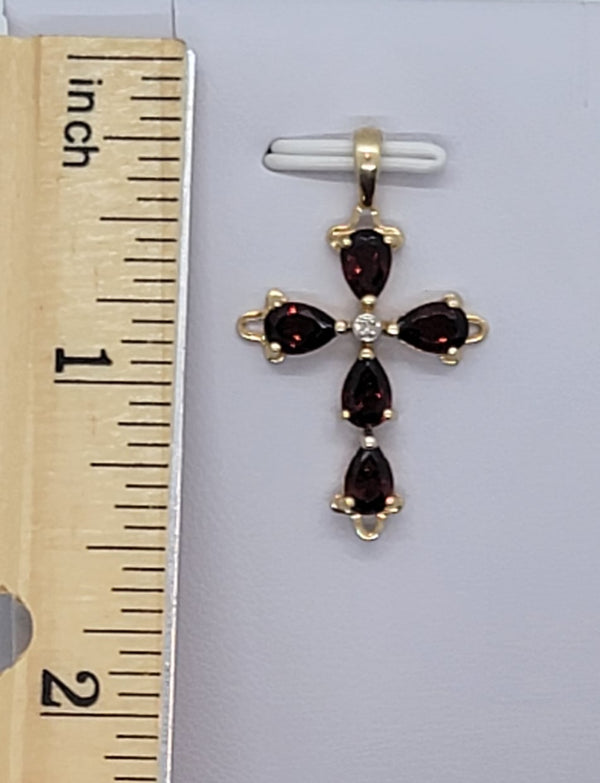 14 k Gold Charm with red stone
