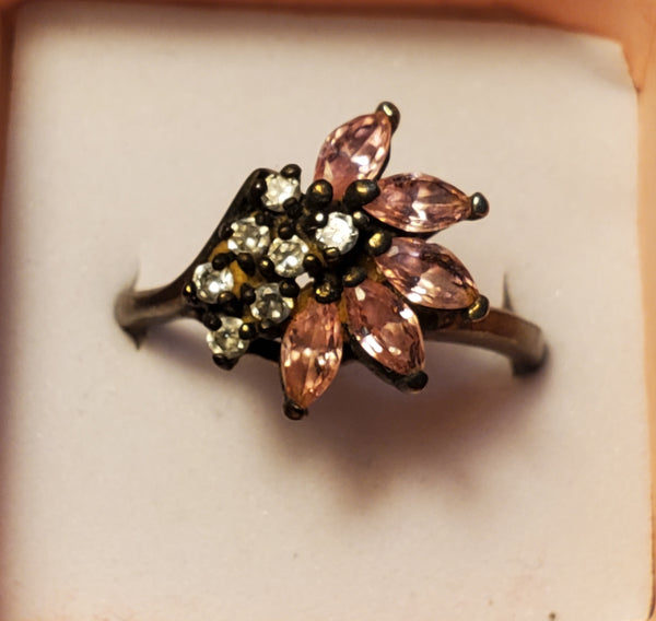 Silver ring with pink and white stone