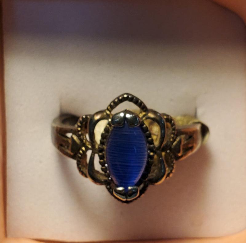 Silver ring with blue stone